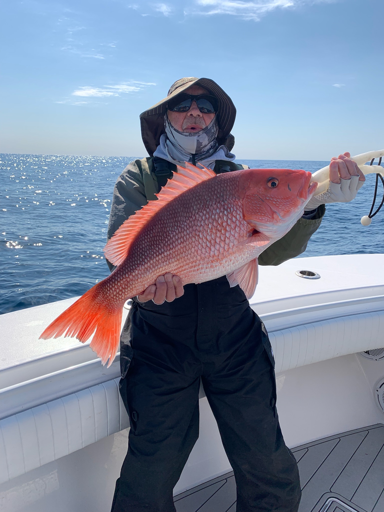 Pappy catching a snapper